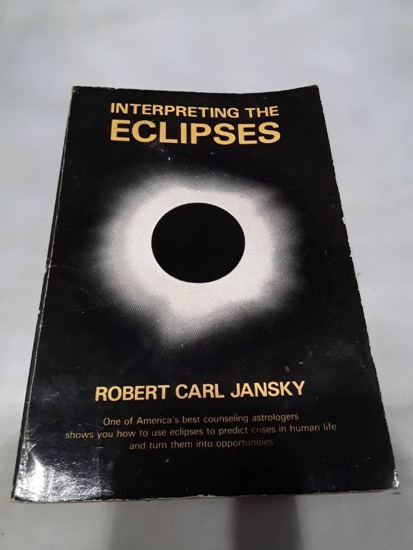 lot 10593 image: Interpreting the Eclipses by Robert Carl Jansky (1979)