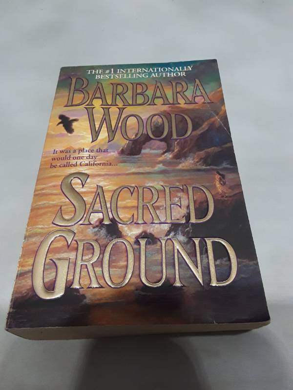 lot 10828 image: Sacred Ground by Barbara Wood - First Paperback Edition (2002)