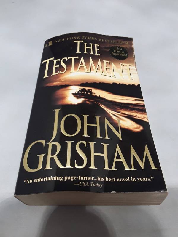 lot 10831 image: The Testament by John Grisham - First Paperback Edition (2000)