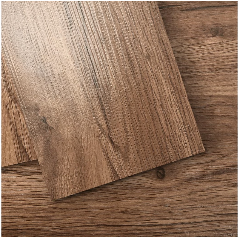 lot 9742 image: Art3d 36-Pack 54 Sq.ft Peel and Stick Floor Tiles Vinyl Plank Flooring Wood Look, Adhesive and Waterproof Tile Sticker for Bedroom, Living Room, Kitchen, RV in Rosewood - Retail $0