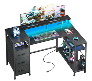 lot 1115 image: 47 Inch Computer Desk with Power Outlets and LED Lights, Reversible Gaming Desk with File Drawer & Monitor Stand, Corner Gamer Desk Table for Home Office with Storage Shelves, Black (similar design as stock photo, see pic, brand new)