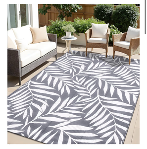 lot 9985 image: Reversible Plastic Straw Rug Leaf Print