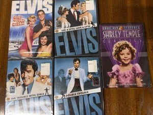 lot 104 image: DVDs - Elvis and Shirley Temple