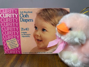 lot 108 image: Vintage Cloth Diapers and Plush Duck