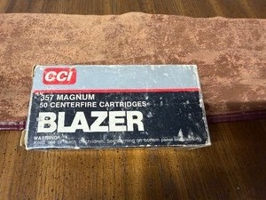 lot 109 image: Blazer 357 Ammo and a Vintage Gun Sleeve