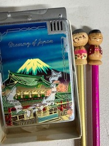 lot 50 image: Vintage Memory of Japan LighterCigarette Holder and Pencils