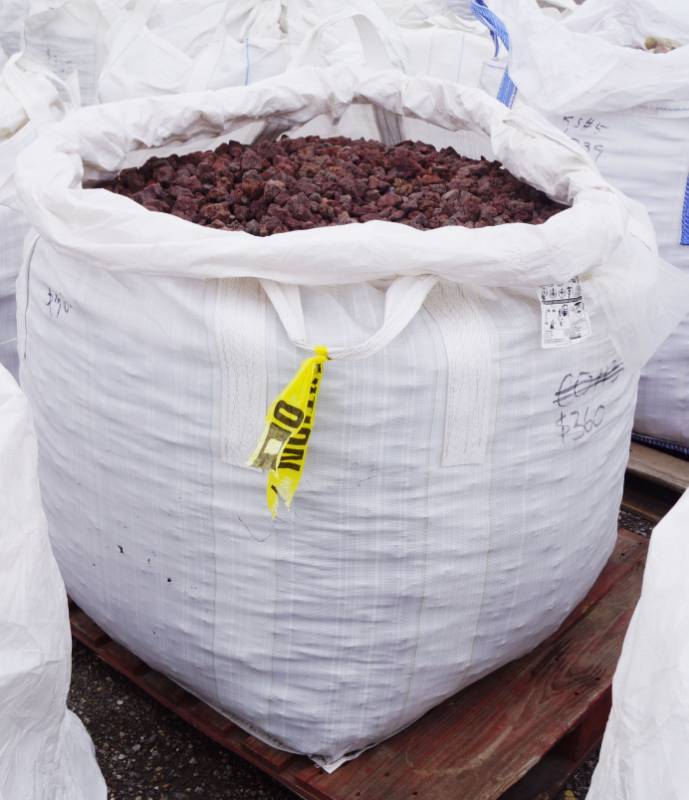 lot 5076 image: Approx. 1 cubic yard bag of approx. 1 Maroon Lava Rock