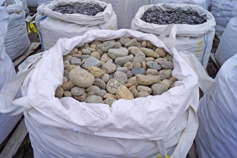 lot 5084 image: Approx. 3,000 lbs. bag of Colorado Salt and Pepper River Rock 2-4  - Landscaping Rocks - Just what youve been looking for