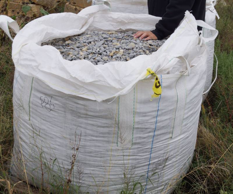 lot 5119 image: Approx. 3,000 lbs. bag of Less than 1.5 Crushed Gray Limestone