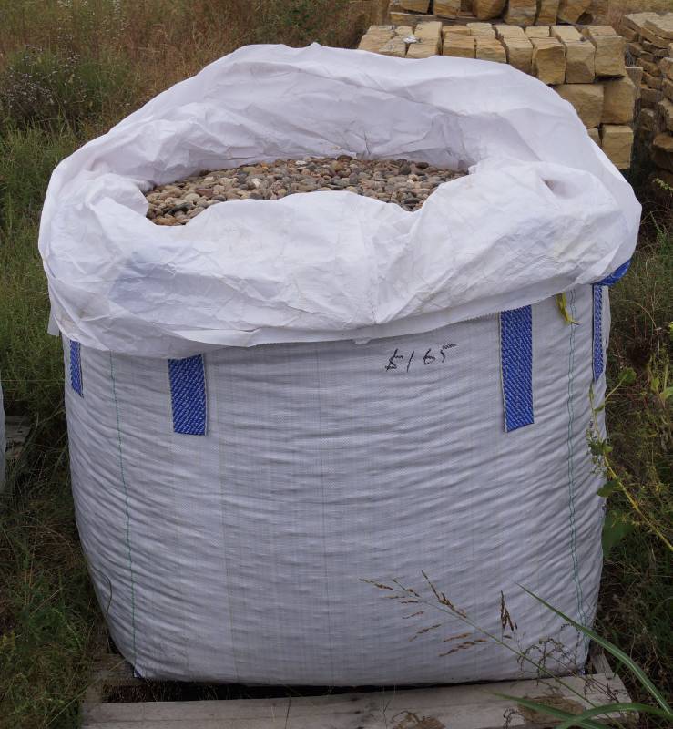 lot 5120 image: Approx. 3,000 lbs. bag of Kansas #3 River Rock (0.75-1.25)  - Landscaping Rocks - Why wait Finish that project now