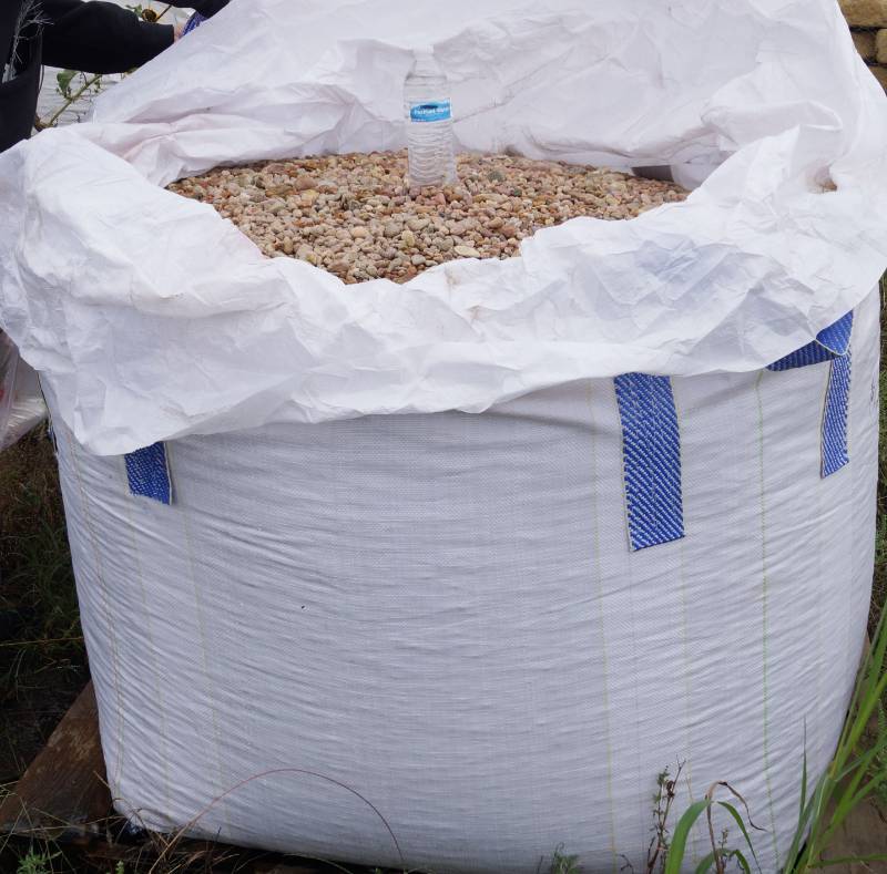 lot 5122 image: Approx. 3,000 lbs. bag of Kansas #2 River Rock  - Landscaping Rocks - Wow