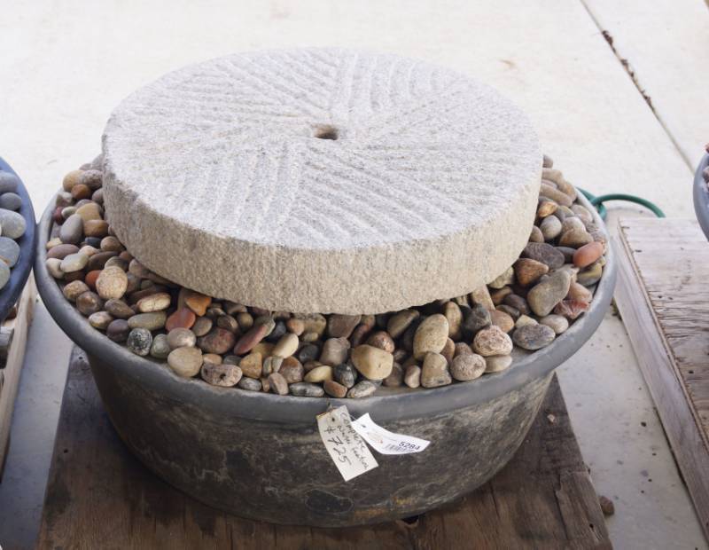 lot 5284 image: Complete Water Feature - Fountain - Drilled Granite Grinding Wheel with Colorado #2 Premium River Rock - SEE VIDEO