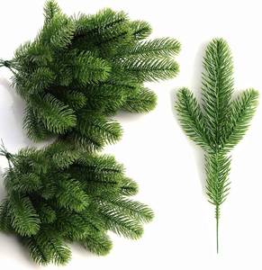 lot 12171 image: KLEWEE 60 Pcs Artificial Pine Branches, Christmas Tree Filler Branches, Realistic Faux Christmas Greenery Green Plants Pine Picks and Stems for Christmas Decorating Crafts Vase DIY Wreath Garland