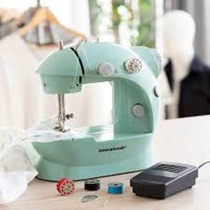 lot 9836 image: Mini Sewing Machine