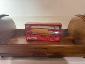 lot 112 image: Vintage Dolphin Teak Wood and Glass Bread Box plus a Pyrex Butter Dish