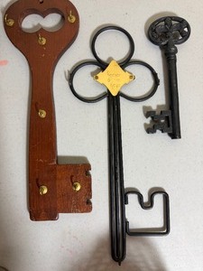 lot 146 image: Wood and Metal Key Organizers, Cast Iron Key