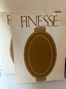 lot 223 image: Vintage Finesse Cast Iron and Porcelain Casserole Dishes (2), Brown (Opened) and Red (Sealed) Boxes