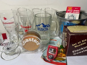 lot 229 image: Vintage Advertising Beer Glasses and Metal Bucket, Coasters, Bottle Openers
