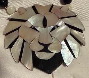 lot 300 image: Jewelry - Lee Sands Shell Lion Necklace