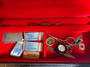 lot 308 image: Foreign Coins, Money Clips and More in Wood Box (clasp needs to be repaired)