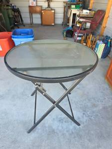 lot 50 image: Round Glass Top Folding Patio Table