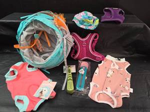 lot 242 image: Small Dog Pet Accessories Bundle with Cat Tunnel and Harnesses