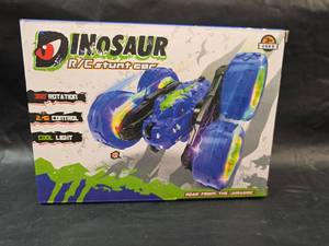 lot 250 image: Dinosaur RC Stunt Car with LED Lights