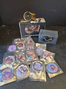 lot 527 image: Taylor Swift Turntable Record Player Air Fresheners with Music Collection Scented Disks