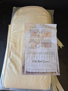 lot 553 image: Crib Rail Covers Set - Pale Yellow