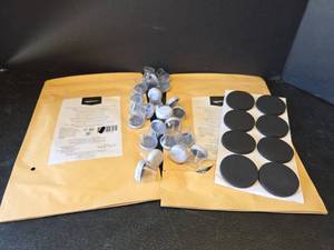 lot 562 image: AmazonBasics 2in. Round Rubber Furniture Pads and 24pc Furniture Leg Protectors