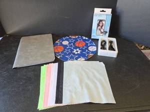 lot 565 image: Mouse Pad, Microfiber Lens or Screen Cleaning Cloths, Portable Dry Erase Notebook, and Auto Clicker Device for Phone