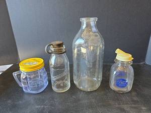 lot 623 image: Collectible Glass Milk Bottle and Jar Collection