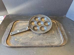lot 629 image: Cast Iron Egg Pan and Grill Pan Set