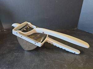 lot 641 image: Stainless Steel Potato Ricer