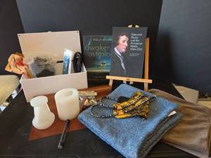 lot 664 image: Books, Silicone Candle Molds, Pillow Covers, Faux Brown Leather, Med Dog Collar, and More