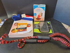 lot 685 image: Fitness Resistance Band, Pregnancy Yoga DVD, Wrist and Headbands, and Large Phone Armband