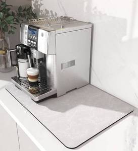 lot 693 image: Coffee Mat Stain Protector (machine not included)