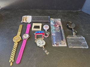 lot 705 image: Watches, Jewelry, Badge Clips, and Accessories