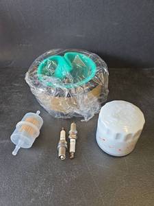 lot 722 image: NIB Engine Maintenance Kit with Air Filter, Oil Filter, Spark Plugs and Fuel Filter Model 2408303-S  for Kohler Lawnmower Engines