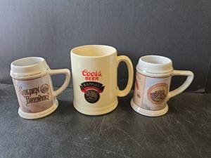 lot 772 image: Coors Beer Commemorative Mugs