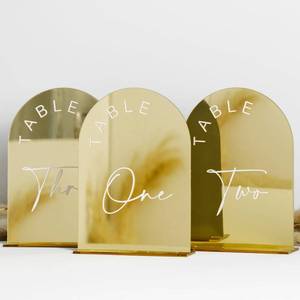 lot 8222 image: Gold Mirrored Arch Wedding Table Numbers 1-20 with Stands, 5x7 Inch Acrylic Arch Sign with Holder, Table Numbers 1-20, 5x7)