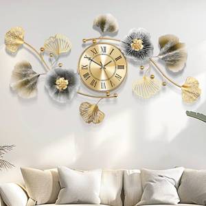 lot 13536 image: Axioglo Wall Clocks for Living Room Decor,Large Wall Clock,3D Creative Metal Ginkgo Leaf Design,with Silent Movement Wall Clocks for Home Wall Decor Clock��33x18��