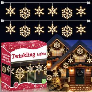 lot 15256 image: Meonum Twinkling Christmas Snowflake Lights with 6 Drops, 8.8FT 14 of 100 Random Twinkling Mini Bulbs Icicle Lights, Snowflake Christmas Decorations Outdoor for House(Warm White,2 Set)