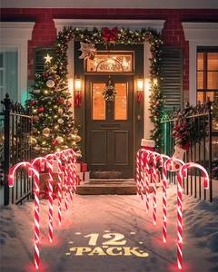 lot 1447 image: COOLWUFAN 12 Pack Christmas Candy Cane Pathway Markers, 17 Christmas Outdoor Decorations Pathway Lights with 60 Warm Lights for Indoor and Outdoor Xmas Holiday Party Patio Yard Decor