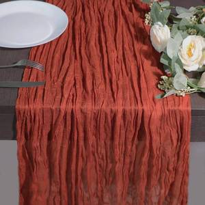 lot 2148 image: Snowkingdom 10 Ft Fall Thanksgiving Table Runner Terracotta Rust Cheesecloth Gauze, 120 inch Long Burnt Orange Boho Cheese Cloth for Wedding Bridal Shower Rustic Sheer Table Decorations