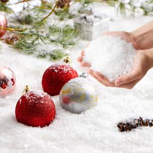 lot 6399 image: JOYIN 12oz Fake Snow Decoration Xmas Artificial Snow, 320g Plastic Fake Snowflakes for Christmas Tree Decoration Holiday Decor and Winter Displays