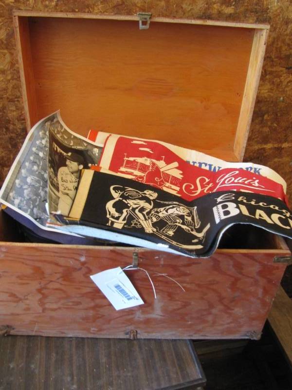 lot 262 image: Boy scout box with vintage pennants, boy scout badges, books, pictures and pins