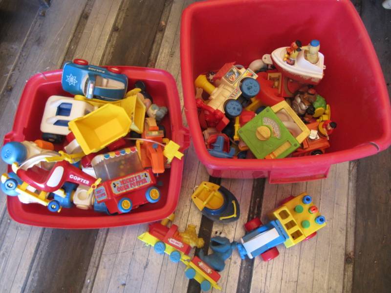 lot 267 image: Red Plastic Box with lid filled with toys some Fisher Price some vintage