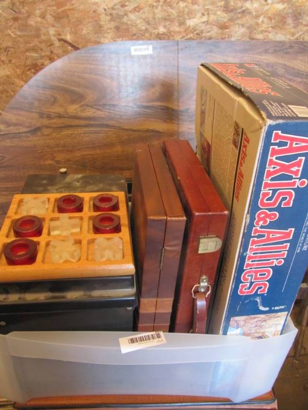 lot 268 image: Box filled with games, Backgammon in wood case,   war game,  tic tac toe, and Backgammon game in leather case