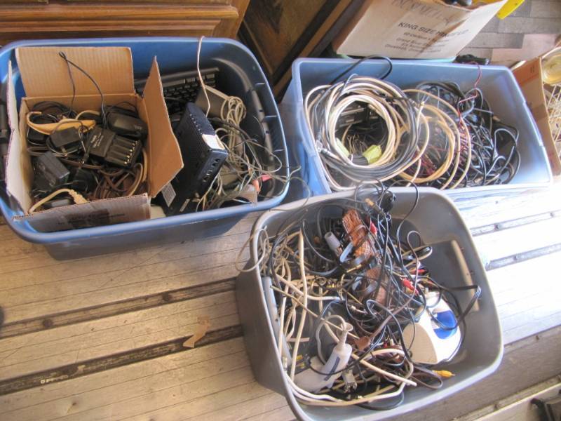 lot 286 image: 3 Containers of cords, cables and electronics, battery chargers, surge protecters